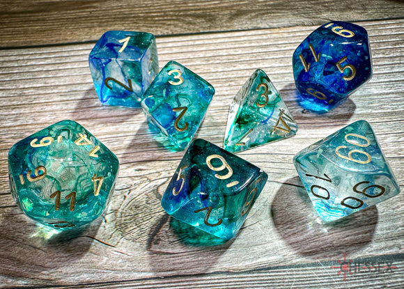 CHESSEX DICE 7PC NEBULA OCEANIC GOLD LUMINARY